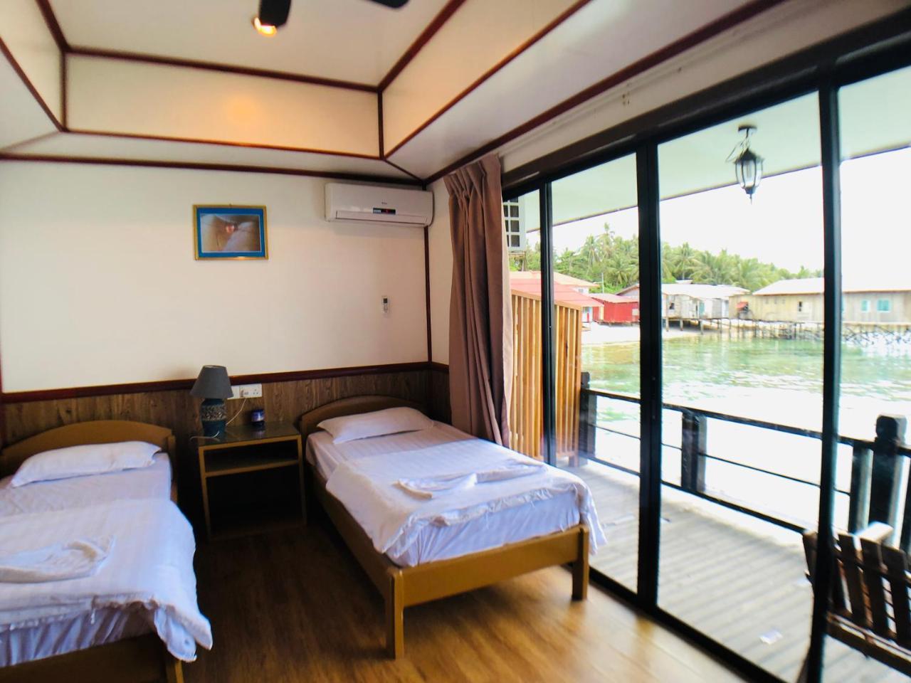 Mabul Paradise Lodge Mabul Island Экстерьер фото